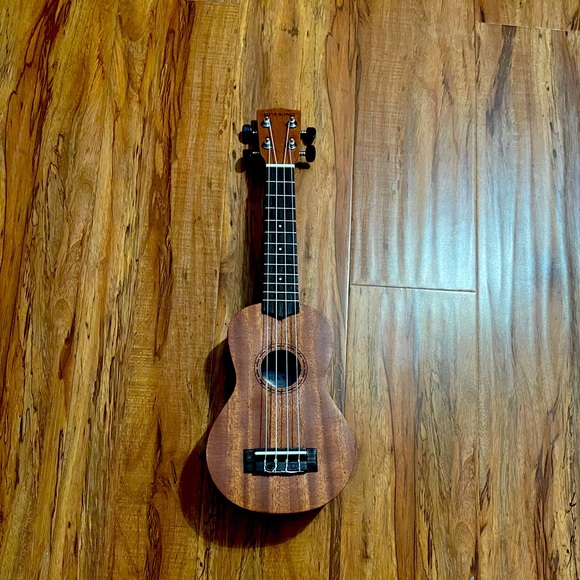 It’s a brand new ukulele for kids. Brand new. $30 But I would rather do a trade - Picture 1 of 6